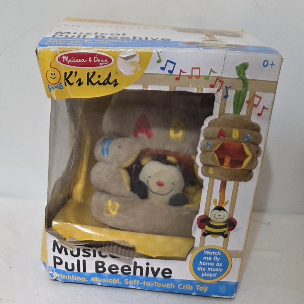 Melissa & Doug Musical Pull Beehive Toy - Yellow and Brown